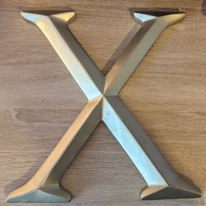 Bronze X decorative wall hanging
